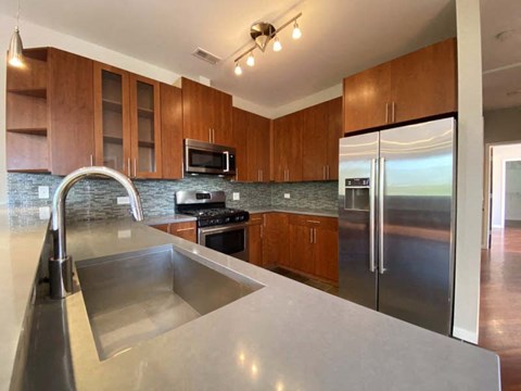 Granite countertops in the spacious kitchen
