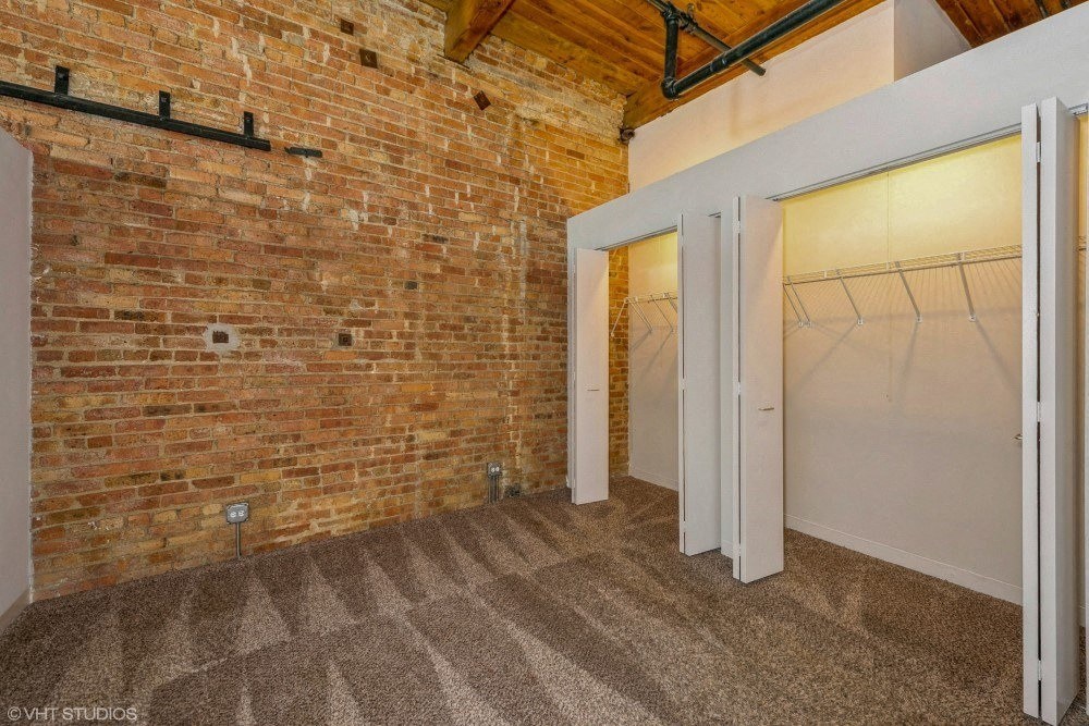 Large closets in the bedroom at Carriage House Lofts, Chicago, 60605