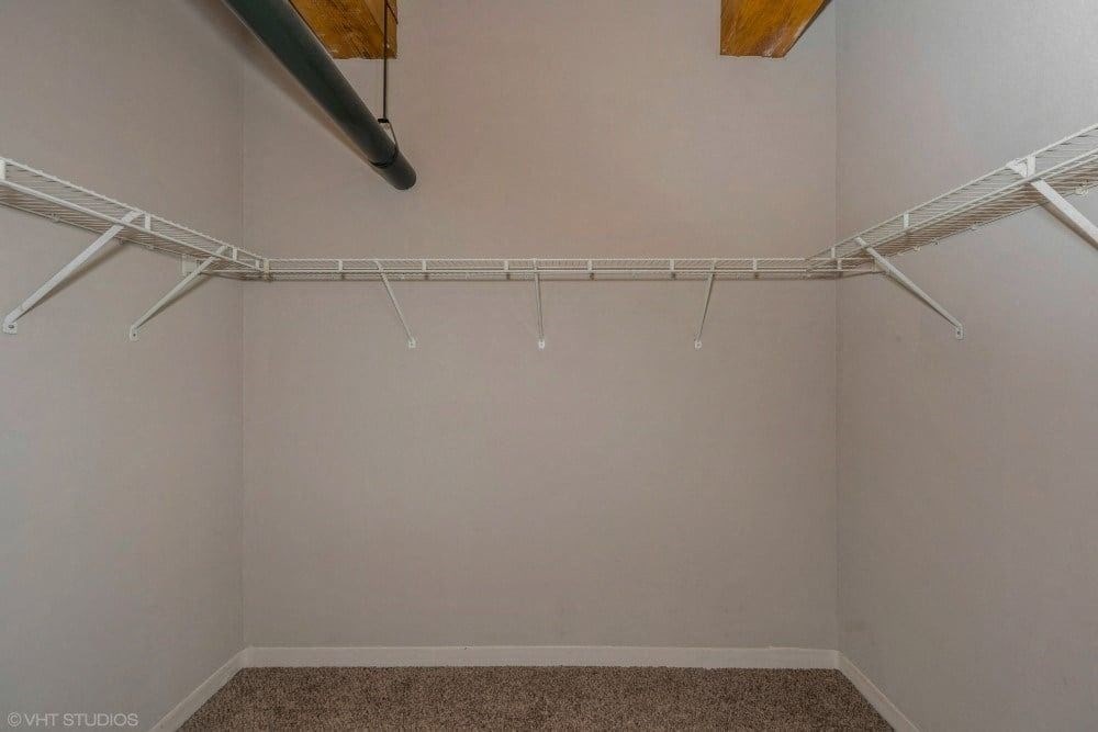 Walk-in closet in the bedroom at Carriage House Lofts, Illinois
