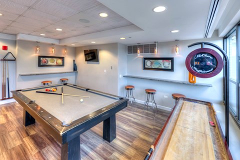 Game room with pool table and shuffleboard1 at Eleven Thirty Apartments, Chicago, Illinois