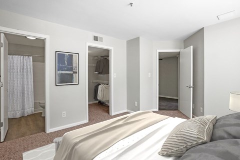 Primary bedroom with convenient private bathroom access and a large closet  at The Crossings at Russett in Laurel, MD