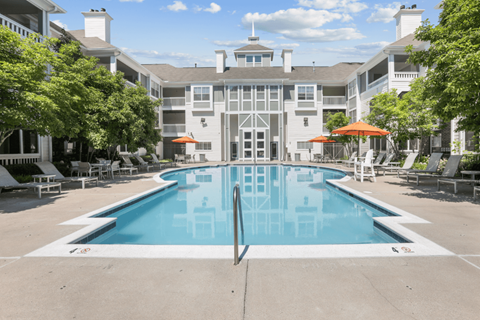 Resort-style pool with sun deck at The Crossings at Russett in Laurel, MD