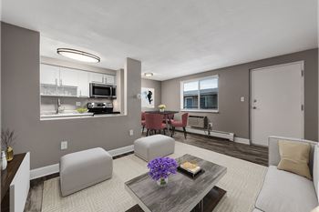 a living room with couches and a table