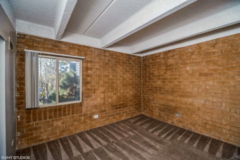 Exposed brick walls and ceiling beams at The Helix in Denver, CO