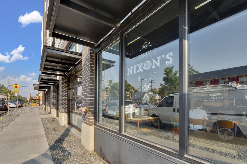 Coffee just down the stairs at Nixon's in Wash Park Station Apartments at Wash Park Station in Denver, CO