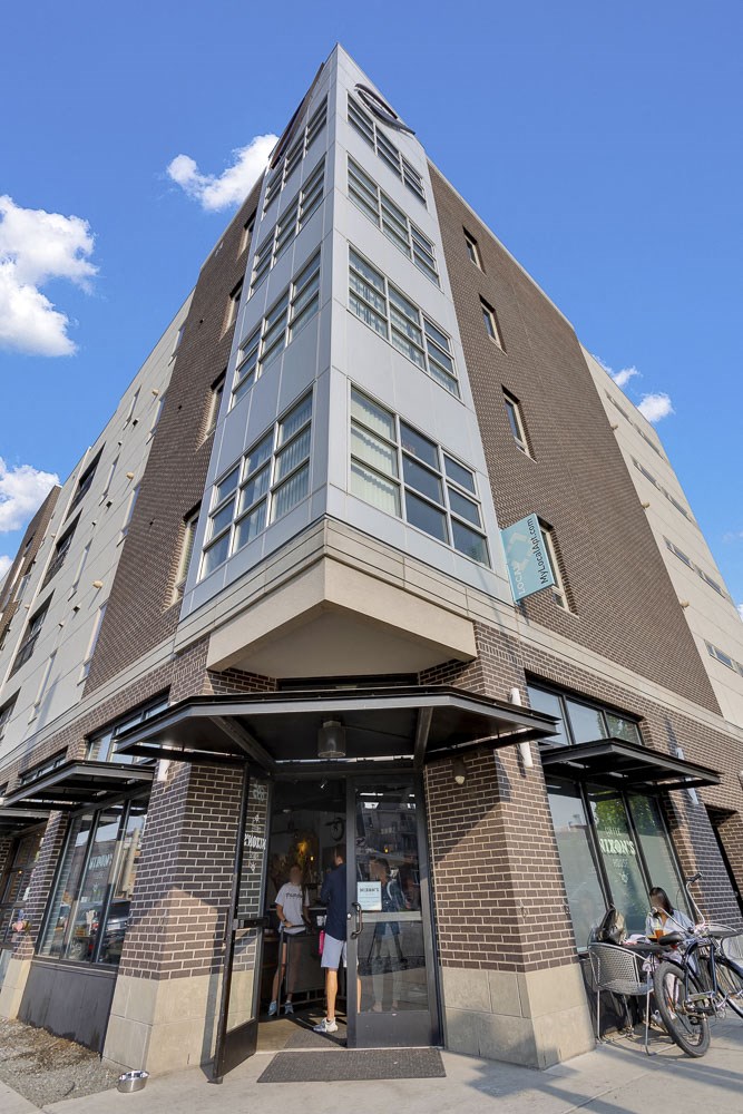 Nixon's Coffee Shop in Wash Park Station Apartments at Wash Park Station in Denver, CO