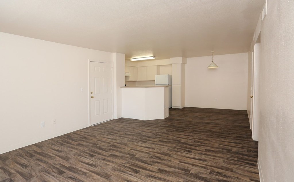 Large open living area with a dining room at Canon de Arrowhead in Albuquerque, New Mexico