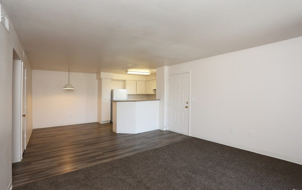 Large open living area with a dining room at Canon de Arrowhead in Albuquerque, New Mexico