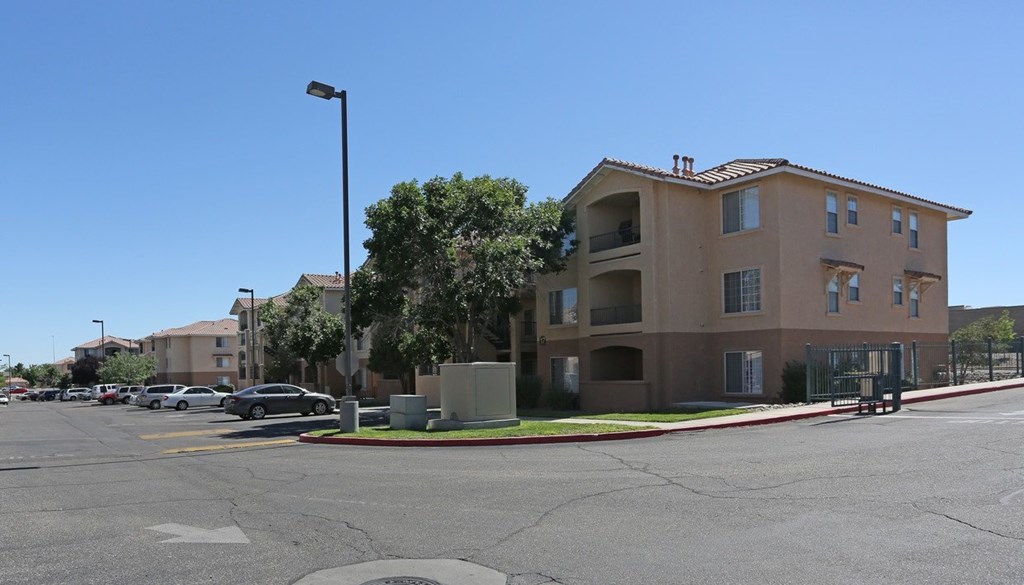 Gated entry and large parking lot  at Canon de Arrowhead in Albuquerque, New Mexico