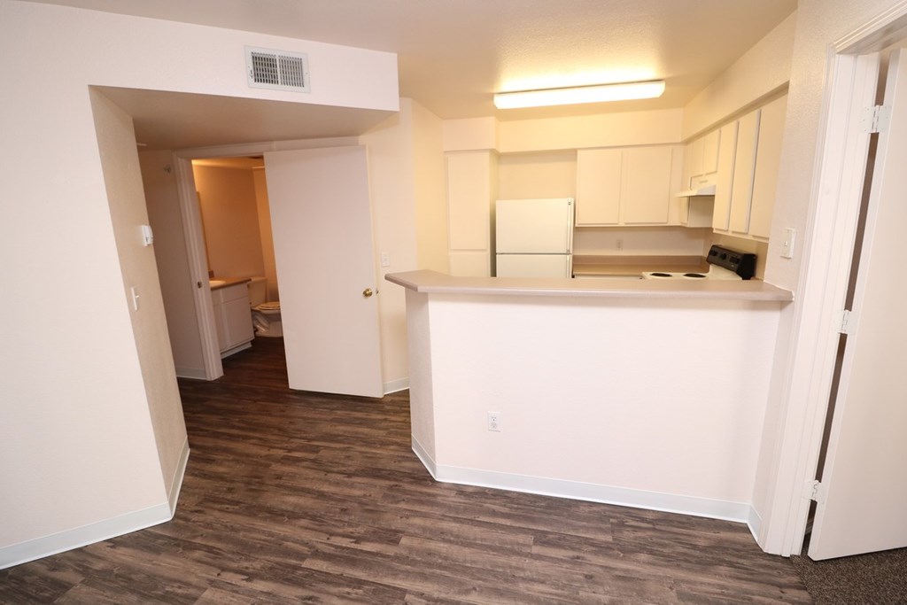Kitchen with a breakfast bar at Canon de Arrowhead in Albuquerque, New Mexico