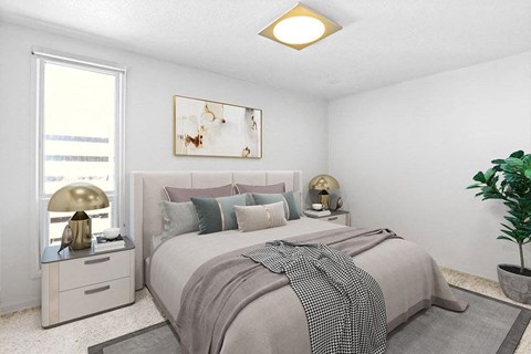 A bedroom with a large bed and a painting above it.