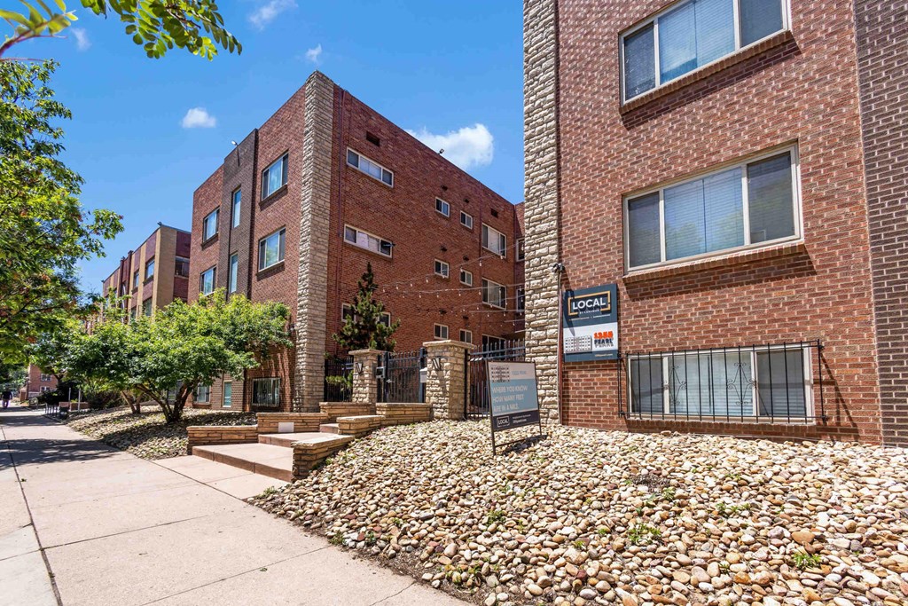 A brick building at 1355 Pearl in Denver, CO exterior