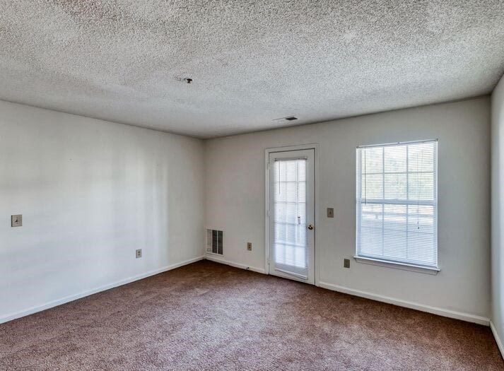 Living area with private patio/balcony access