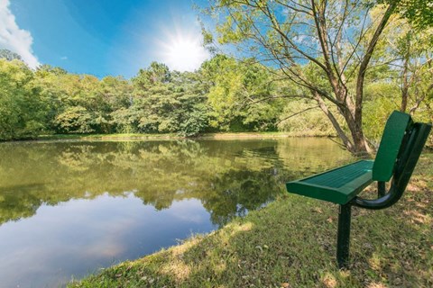 Lovely sitting area near the lake to enjoy the peaceful surrounds in nature at the community