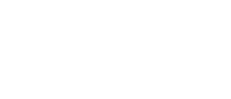 The image is a logo for Rio Volcan Apartments.