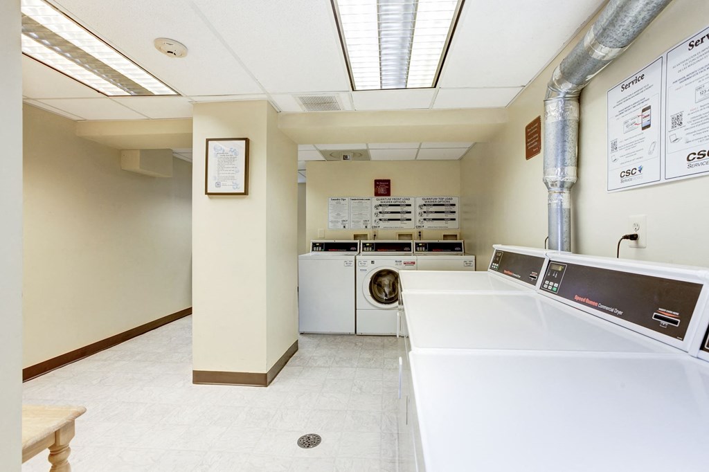 A laundry room with a washer and dryer.