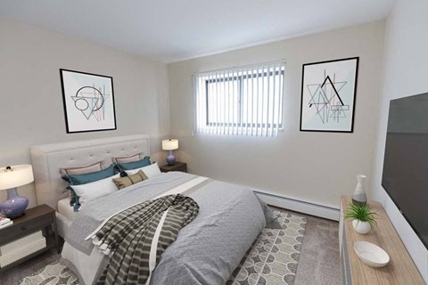 a bedroom with a bed and a tv