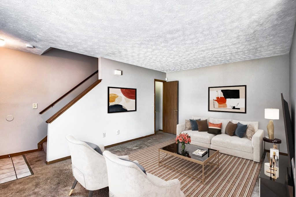 a living room with a couch and a table