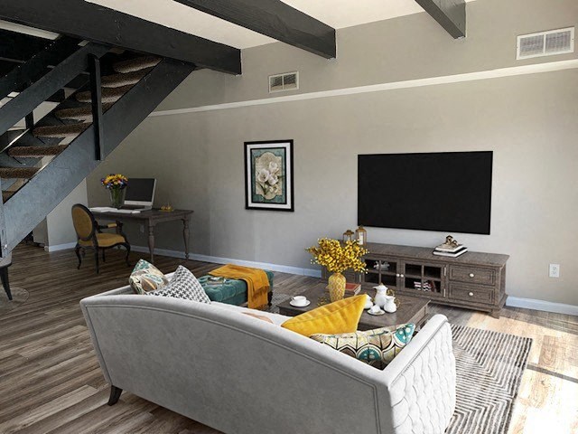 a living room with a couch and a television