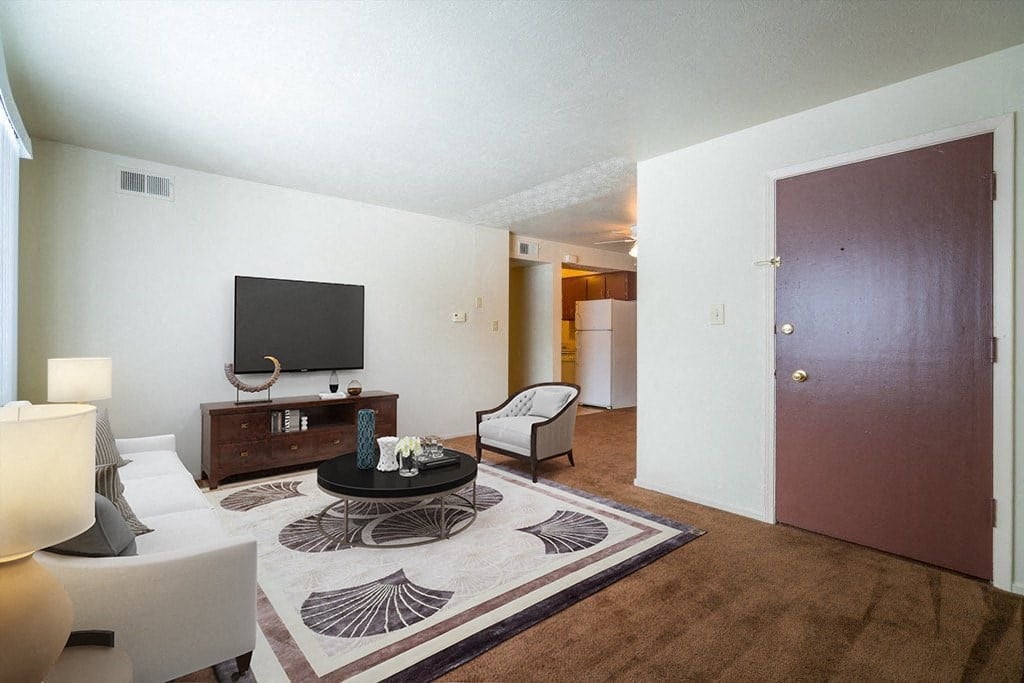 a living room with a couch and a television