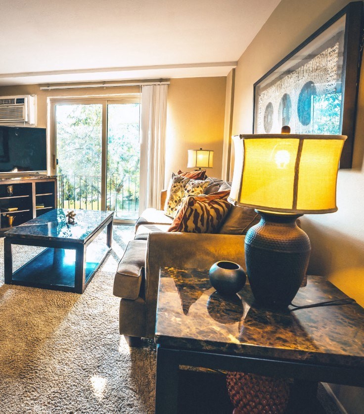 a living room with a couch and a table