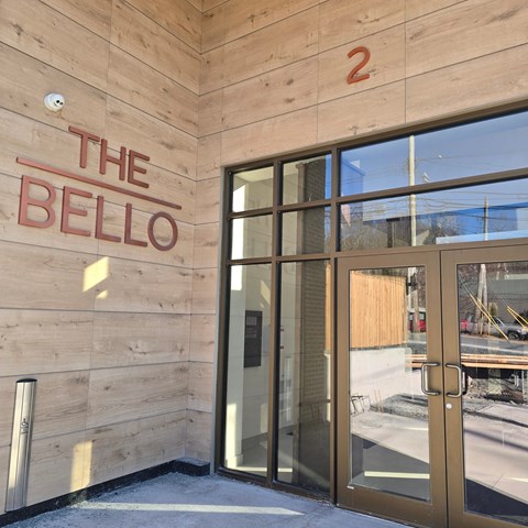The entrance to a building called The Bello.