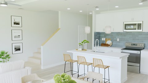 A kitchen with a white counter and bar stools.