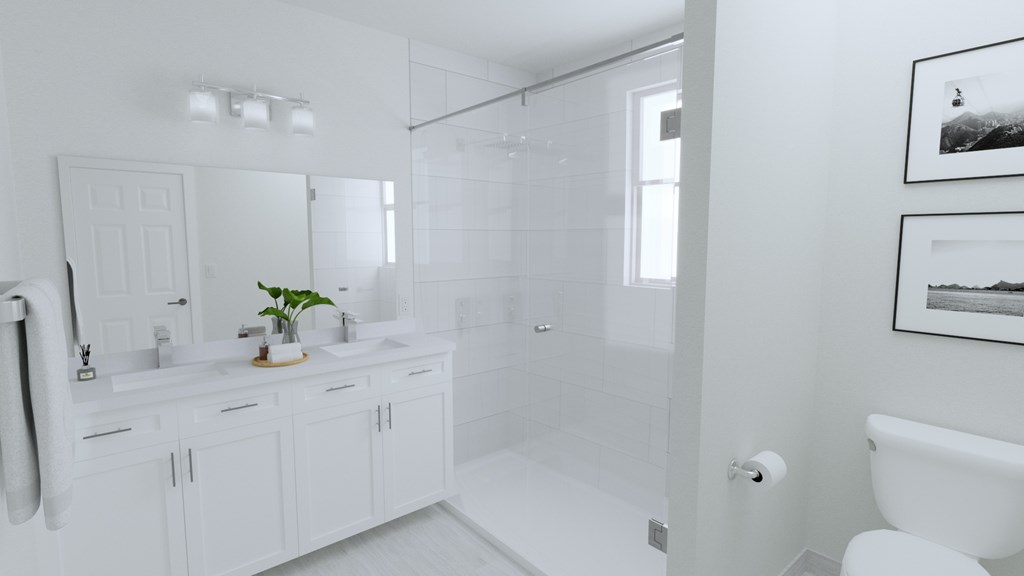 A white bathroom with a sink, mirror, and bathtub.