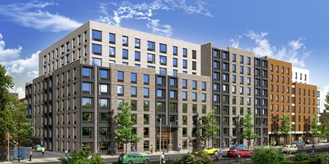 A modern multi-story building with a mix of dark and light colored windows.