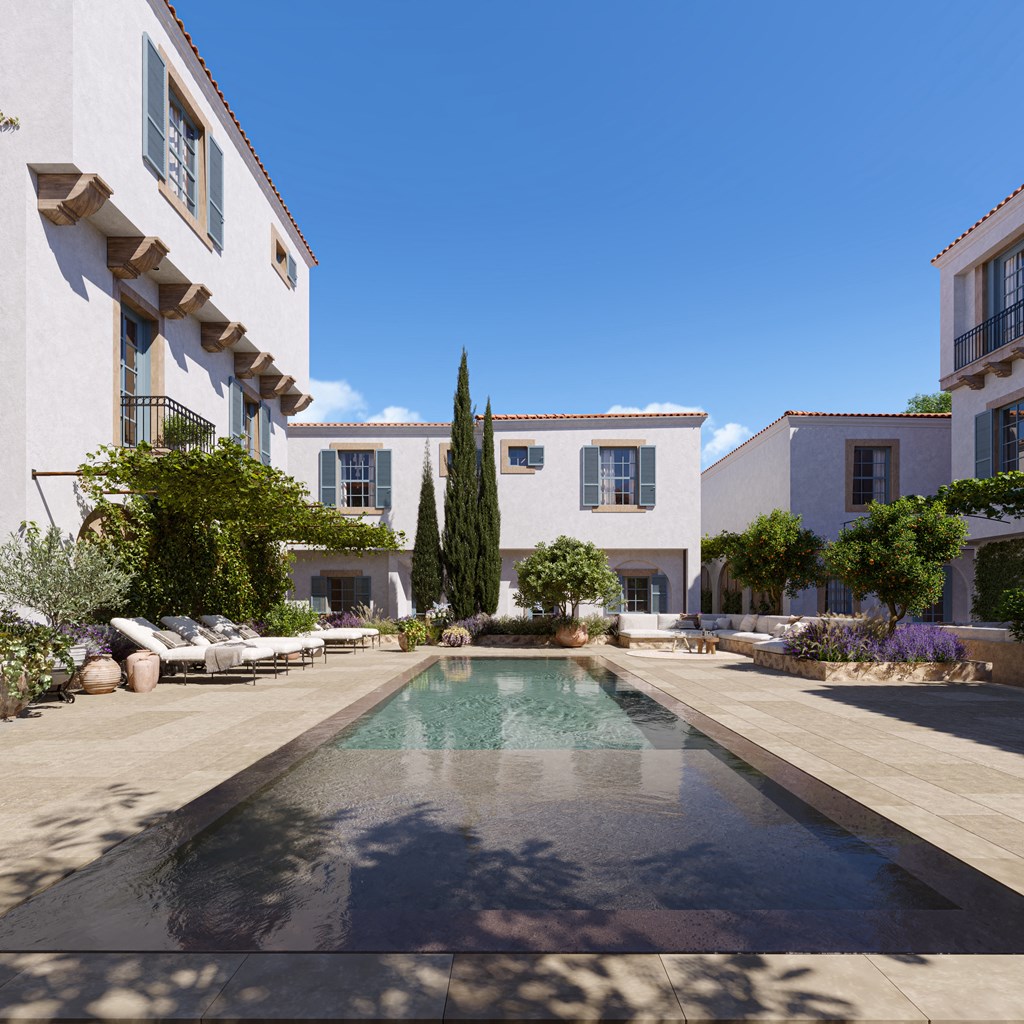 a swimming pool in the middle of a courtyard