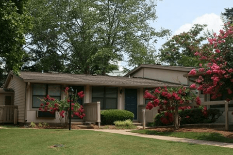 House with green lawn