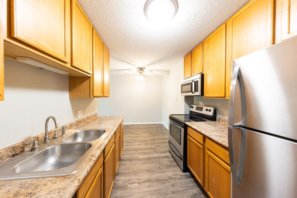 the preserve at ballantyne commons apartment kitchen with stainless steel appliances
