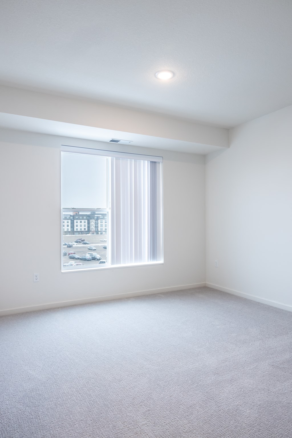 an empty room with a window in it