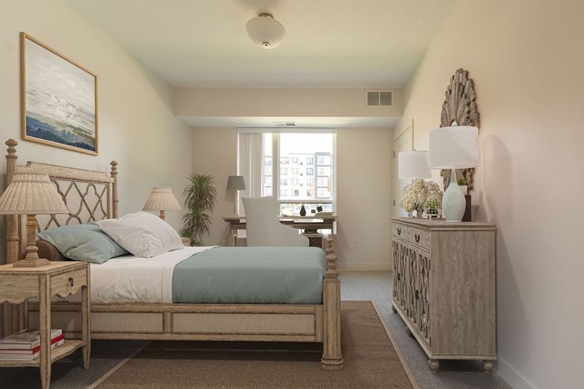 a bedroom with a bed and a dresser - Photo Gallery
