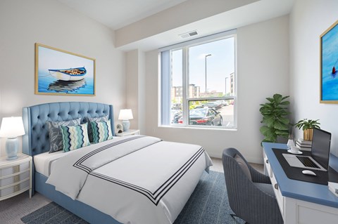a bedroom with a large window and a desk with a computer at Sonder Point 50+ Apartments, Brooklyn Center, MN