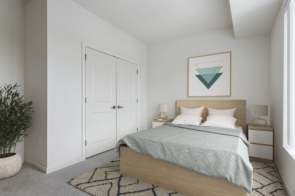 a bedroom with a bed and a painting on the wall