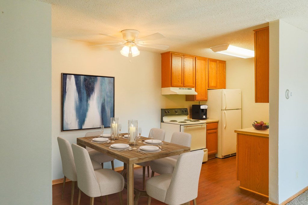 this is a photo of the dining room and kitchen of a 560 square foot 1 bedroom apartment