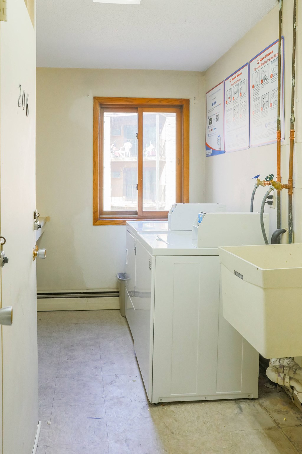 a laundry room with a washer and dryer