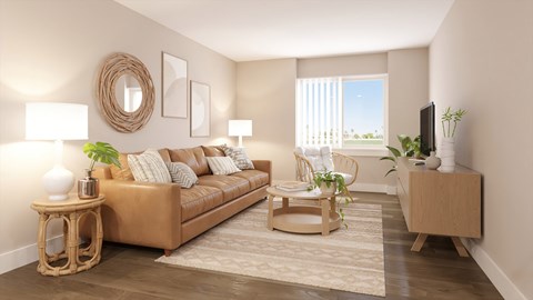 A living room with a brown sofa, a wicker table, and a flat screen TV.