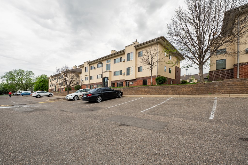 a parking lot in front of a building