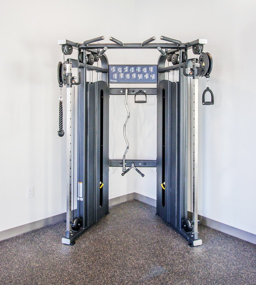 a pair of exercise machines in a room
