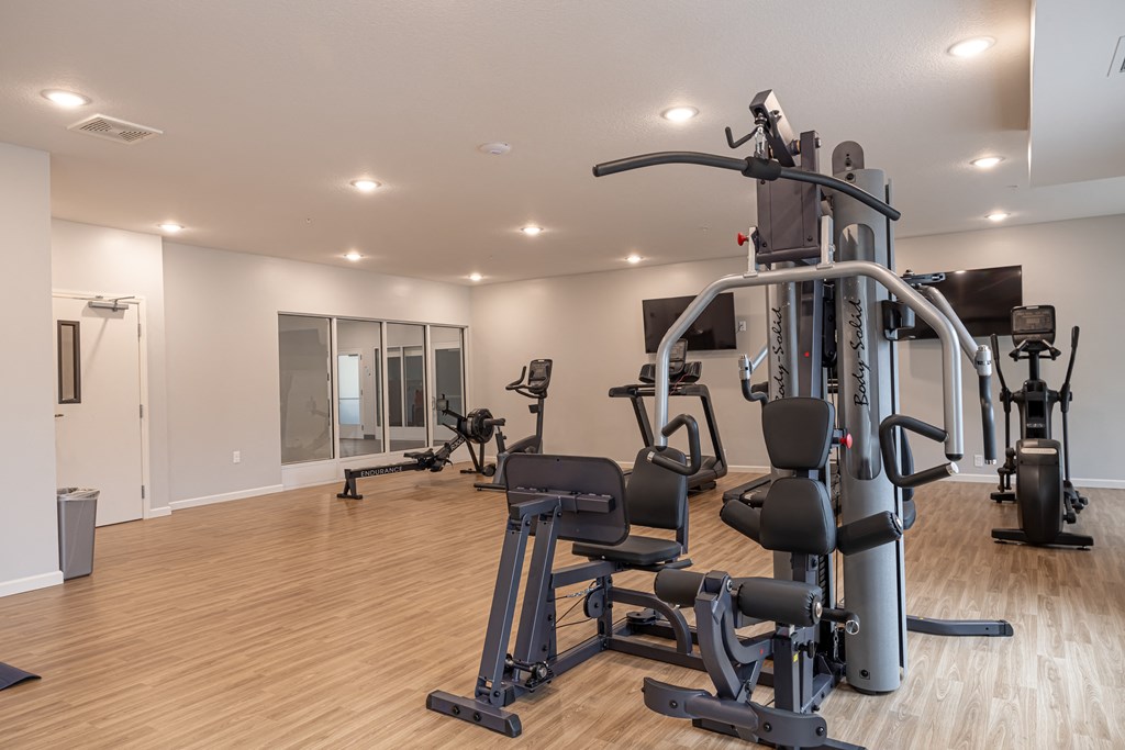 weight lifting machines in fitness room
