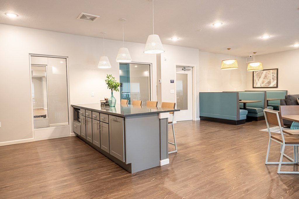 Clubroom kitchen island with barstools