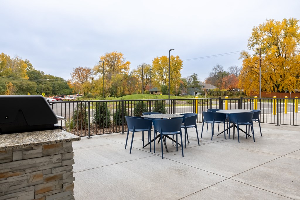 outdoor area with tables and chairs
