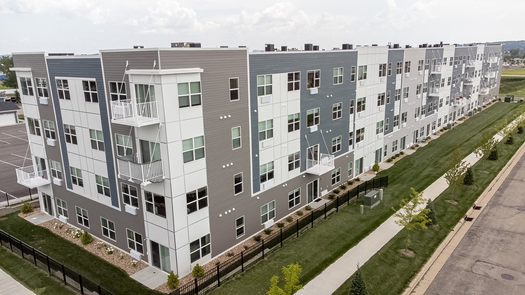 an aerial view of an apartment building on a city street at Technology Park Apartments, Rochester, MN