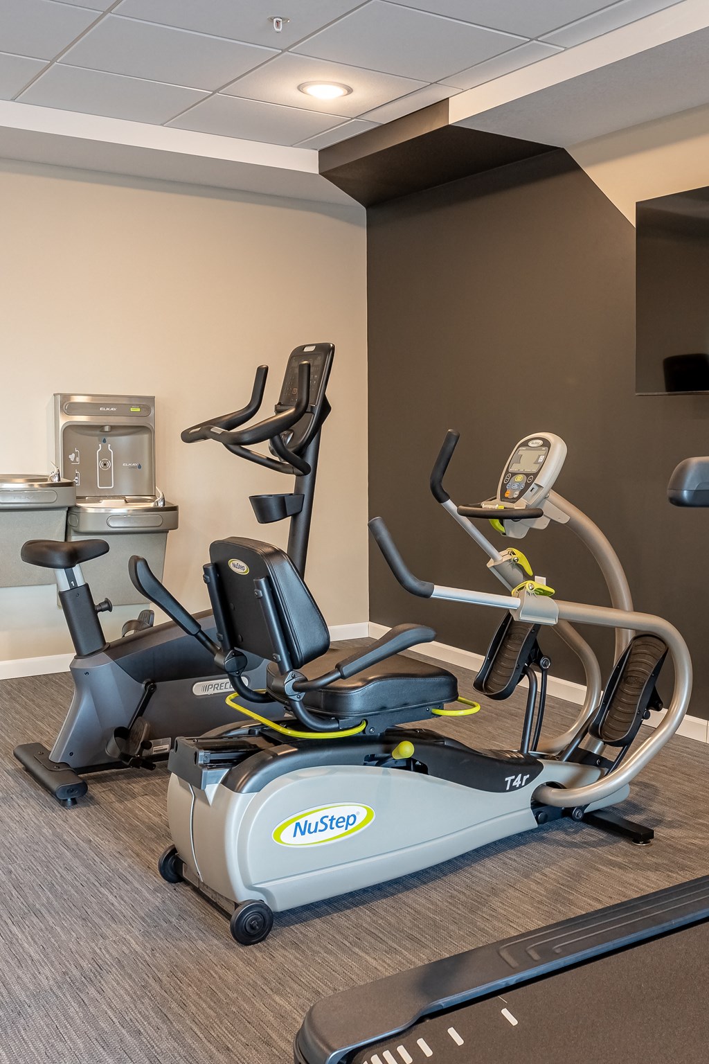 a workout room with exercise equipment at the inn at the crossroads