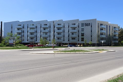 a large building with a street in front of it