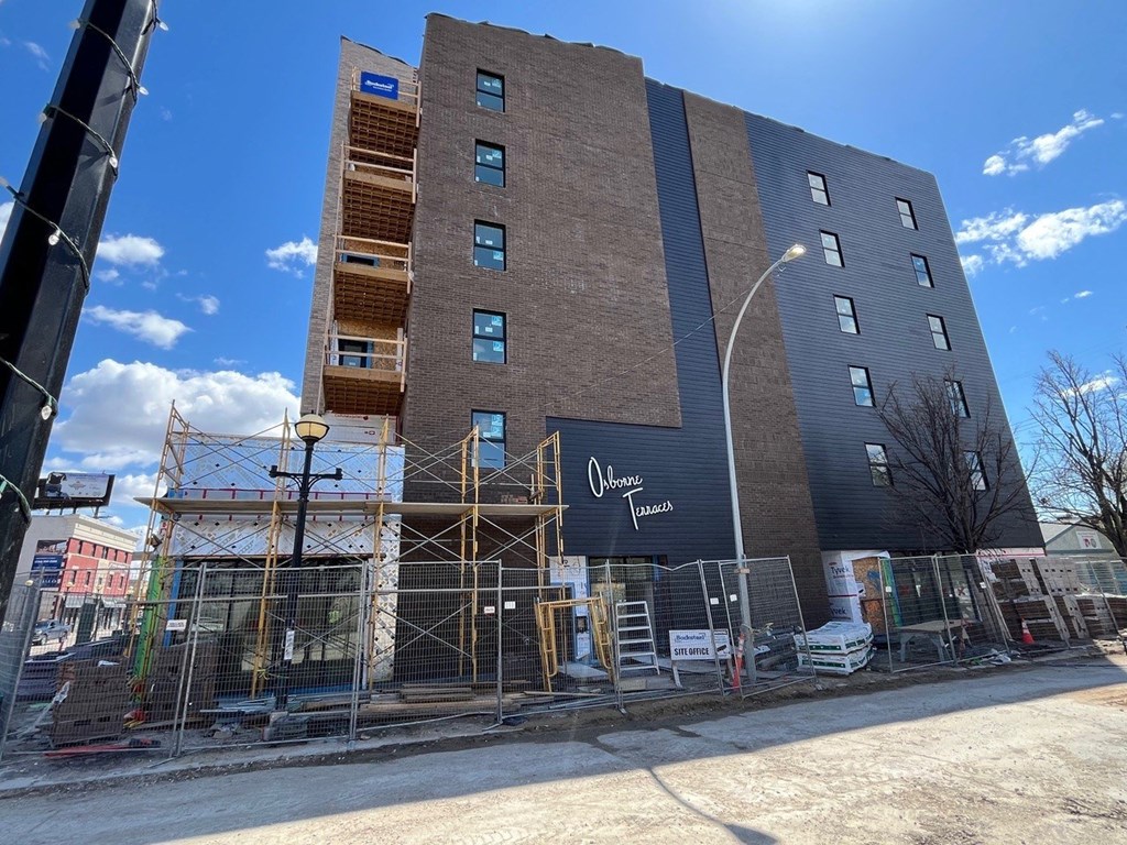 a building with a lot of scaffolding in front of it