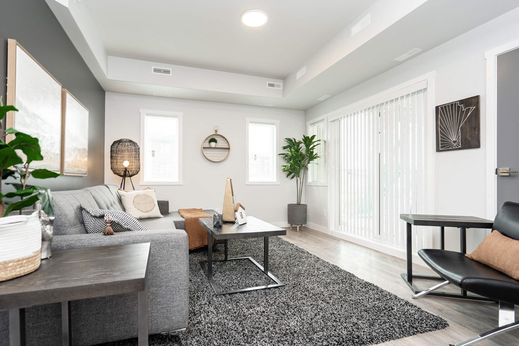 a living room with a couch and a table