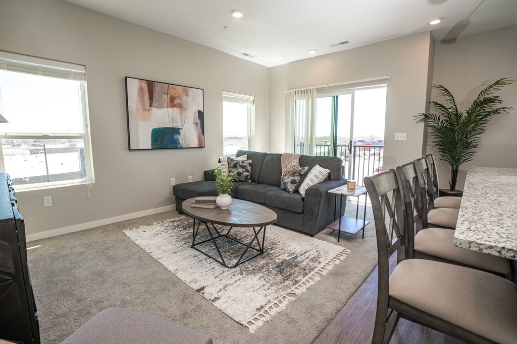 a living room with a couch and a table